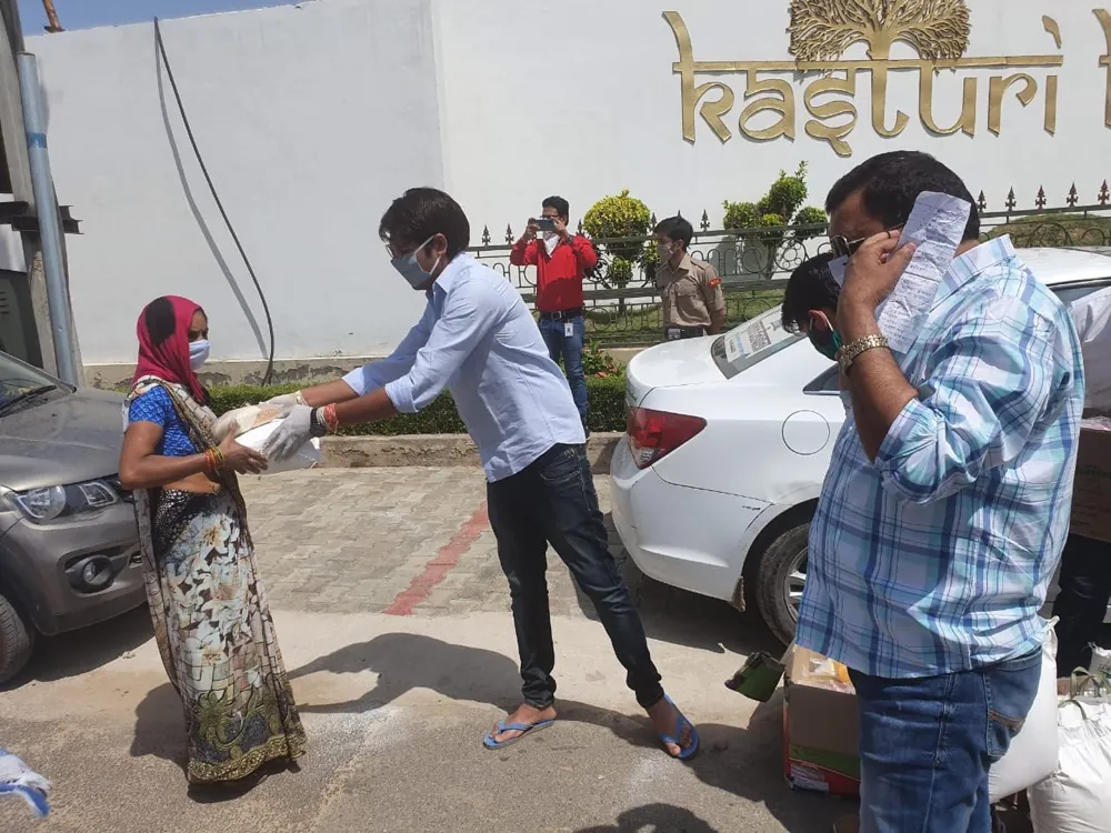 Grassroots Ration & Grain Packet Handover